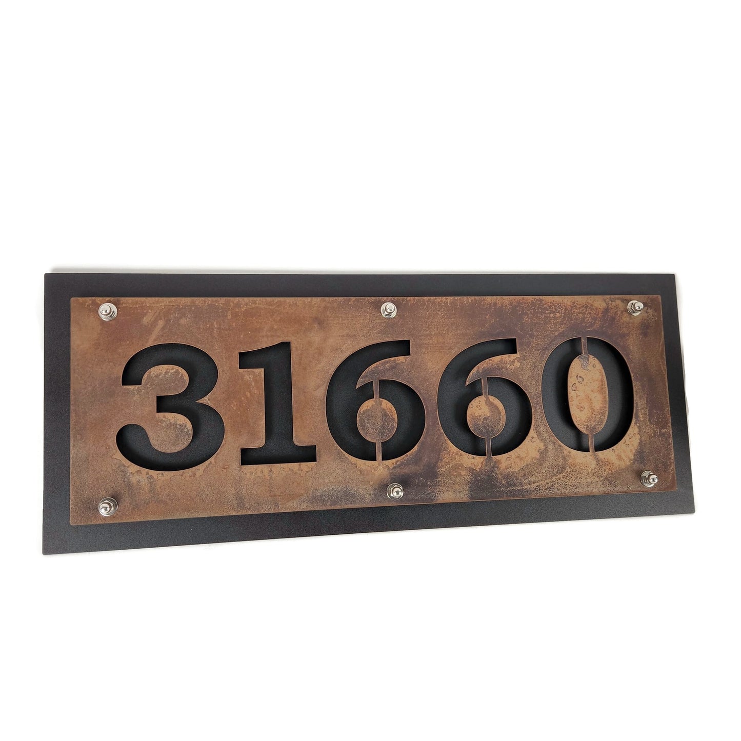 Rust over black layered metal house address sign