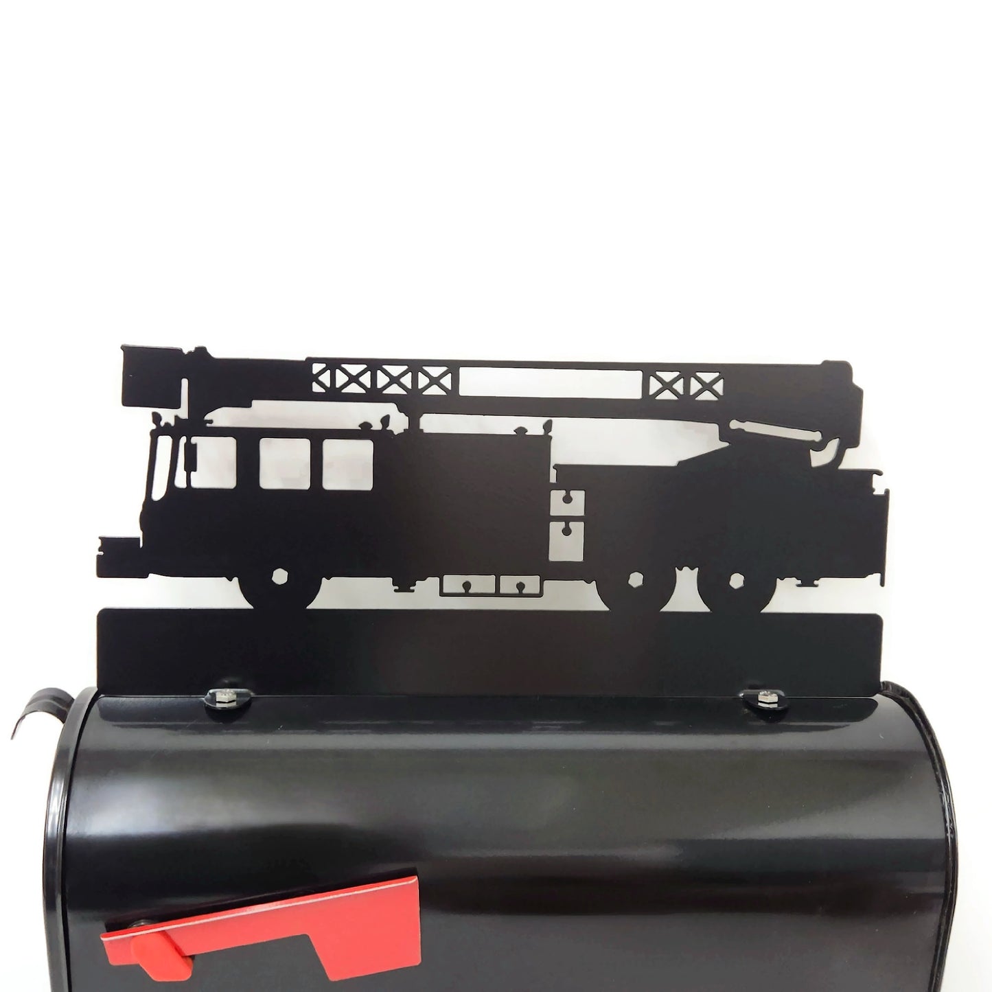 Black fire truck custom mailbox topper installed on a mailbox.