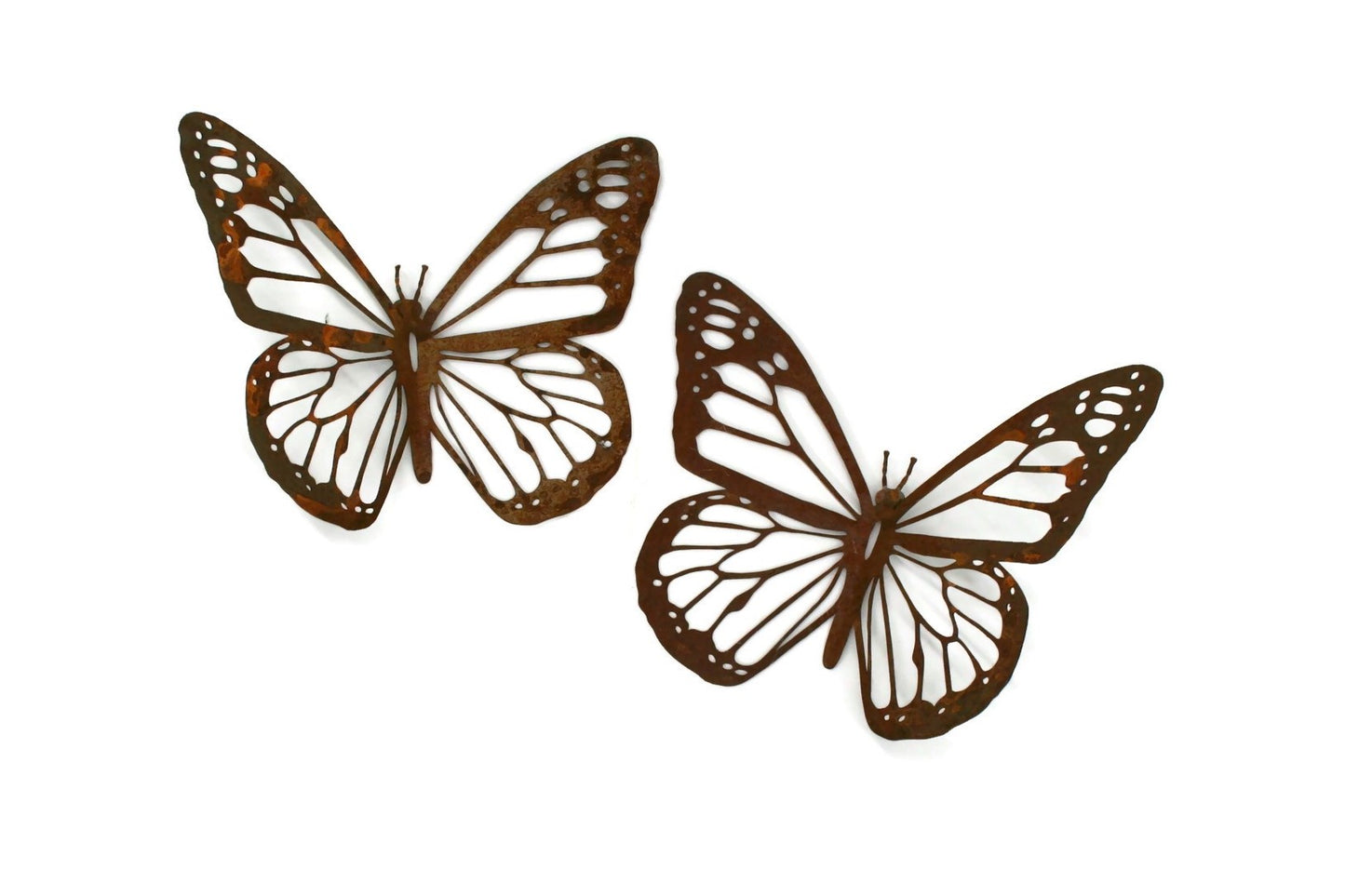 Two rusty metal monarch butterfly wall art