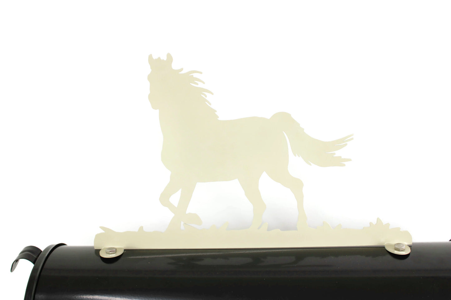 Cream running horse mailbox topper installed on a mailbox
