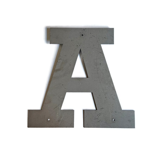Metal letter A in raw steel
