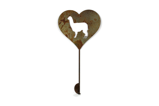 Heart-shaped rusty garden stake sign in rust with an alpaca silhouette