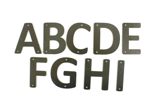 Metal letters A through I in raw steel