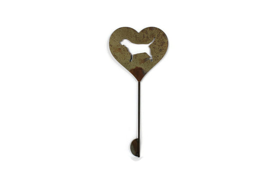 Heart-shaped rusty garden stake sign in rust with a beagle dog silhouette