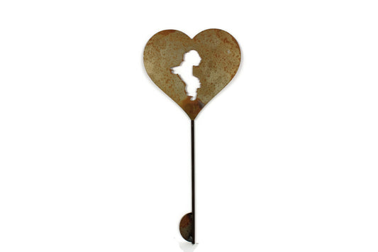 Heart-shaped rusty garden stake sign in rust with a bichon frise silhouette