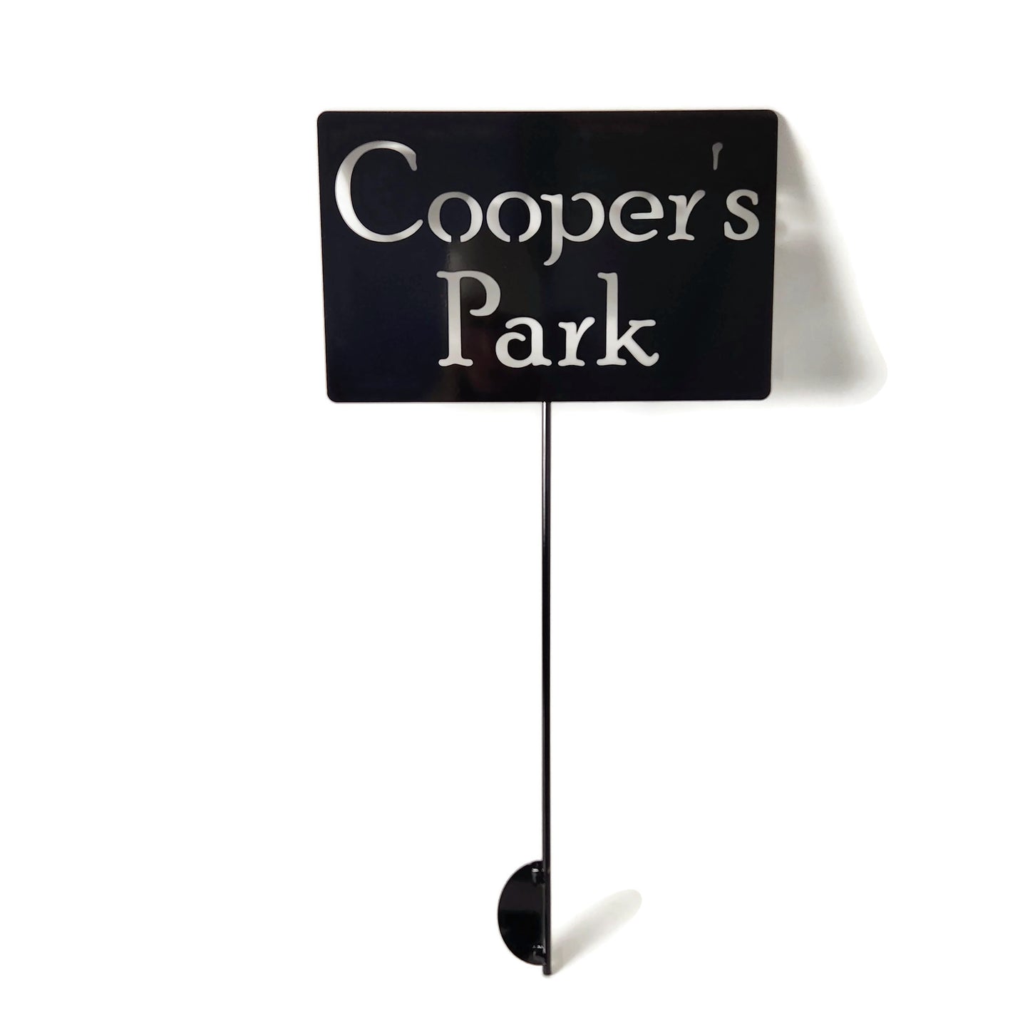 Custom metal garden stake in black powder coat with Cooper's Garden for text