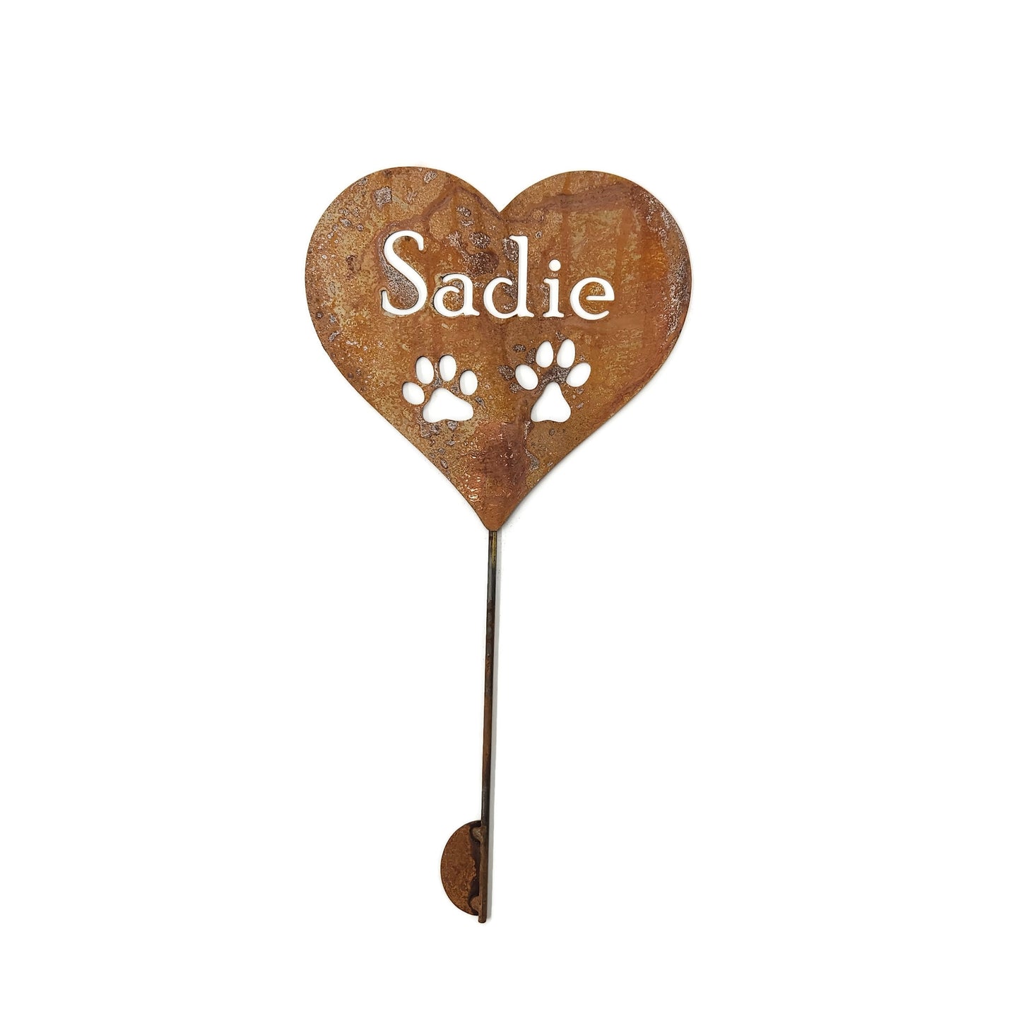 Custom heart-shaped rusty garden stake sign in rust with two paws and Sadie for text