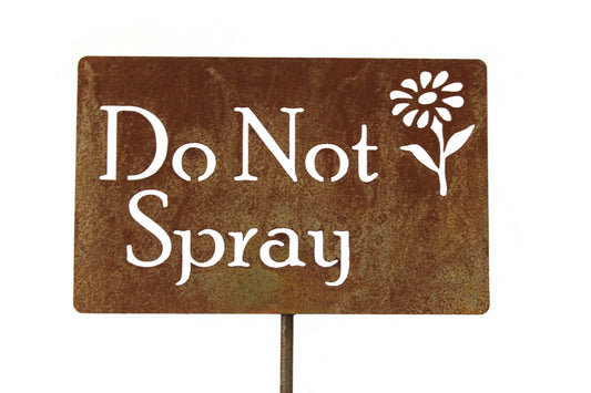 Do Not Spray rusty garden stake sign