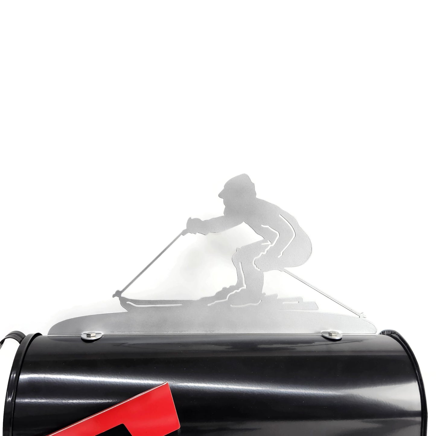 Silver downhill skiing mailbox topper installed on a mailbox.