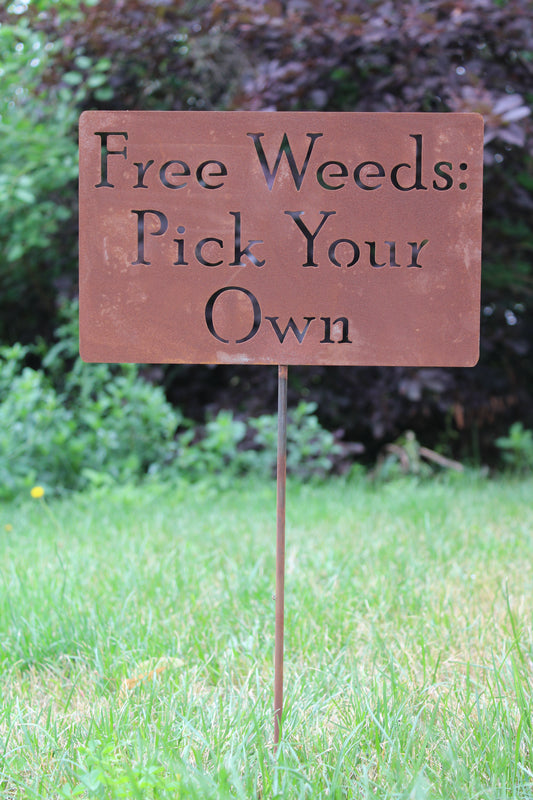 Free Weeds rusty garden stake sign