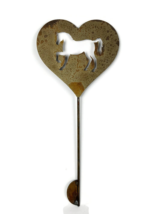 Metal heart shaped garden stake sign with a horse silhouette in rust