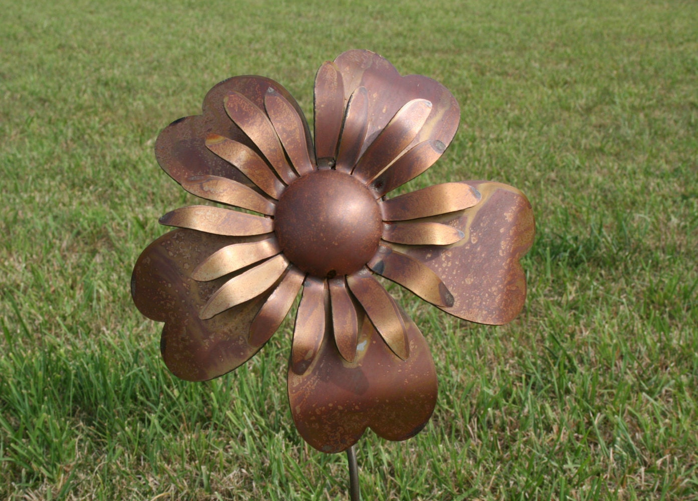 Rusty metal sunflower garden stake