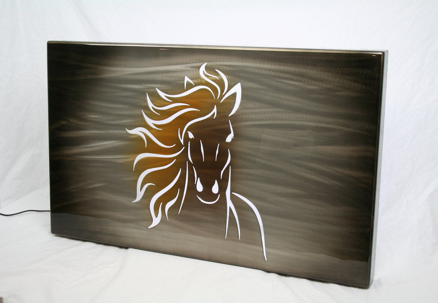 Running horse face silhouette with LED backlighting