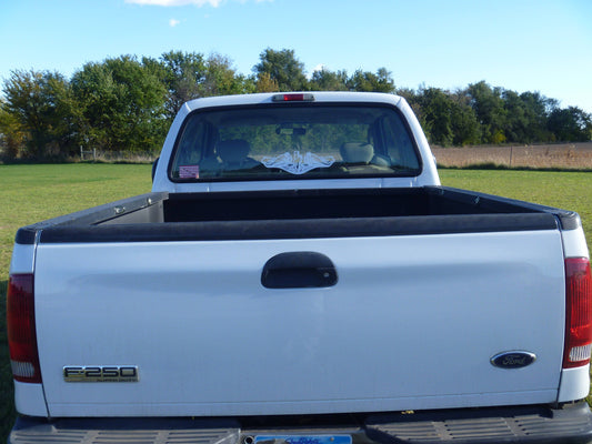 White submarine Dolphins Navy service pin vinyl decal on a pick up