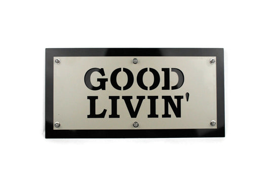 Good Livin' layered metal sign in cream over black powder coat