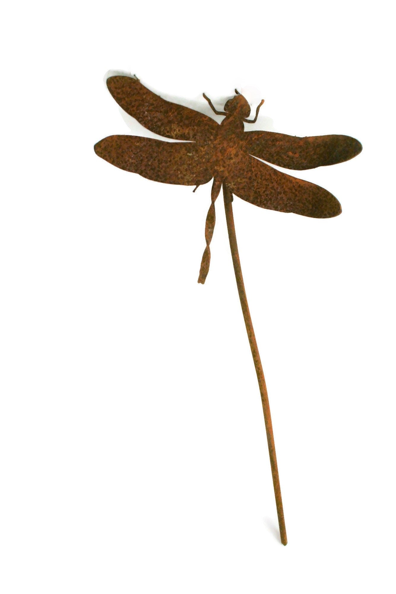 Metal dragonfly garden stake in rust