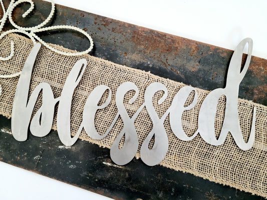 blessed metal script word sign in raw steel