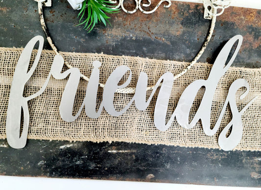 friends metal script word sign in raw steel