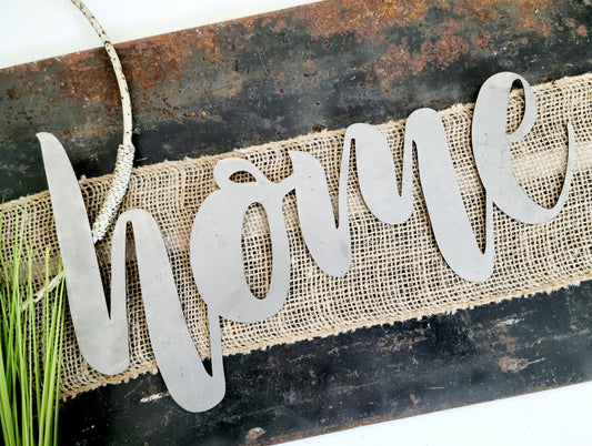 home metal script word sign in raw steel