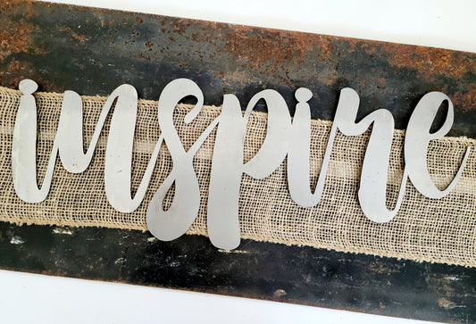 inspire metal script word sign in raw steel