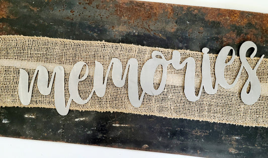 memories metal script word sign in raw steel