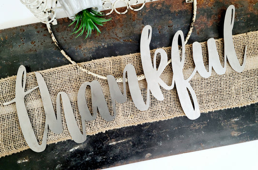 thankful metal script word sign in raw steel