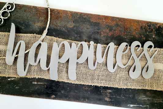 happiness metal script word sign in raw steel