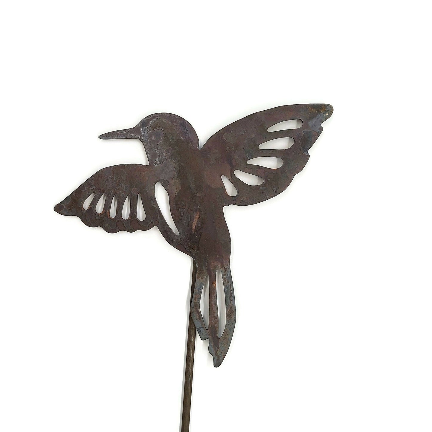 Metal hummingbird garden stake in rust