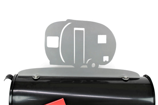 Silver vintage teardrop camper mailbox topper installed on a mailbox