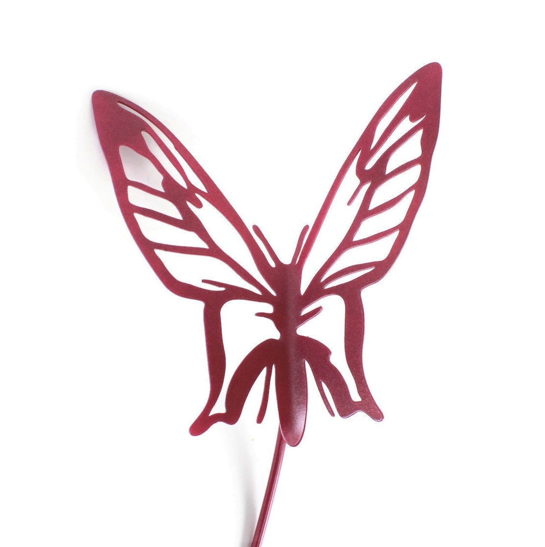 Metal butterfly garden stake in metallic fuschia powder coat