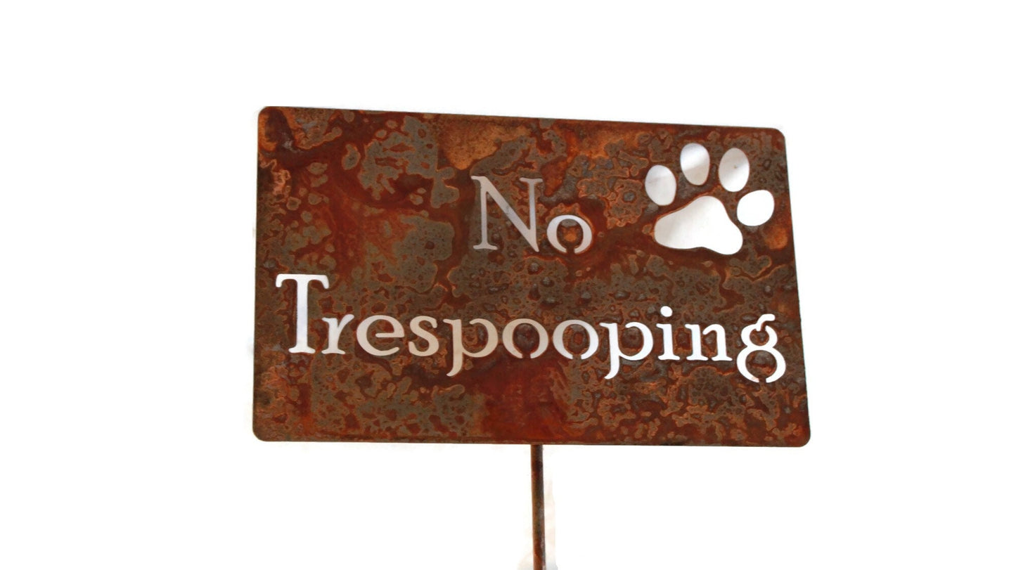 No Trespooping with paw rusty garden stake sign