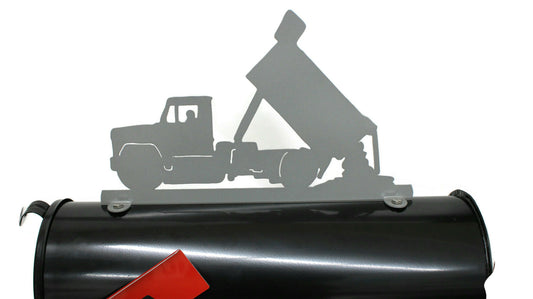 Gray dump truck mailbox topper installed on a mailbox.