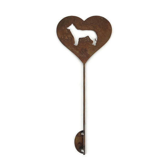 Heart-shaped rusty garden stake sign in rust with a siberian husky dog silhouette
