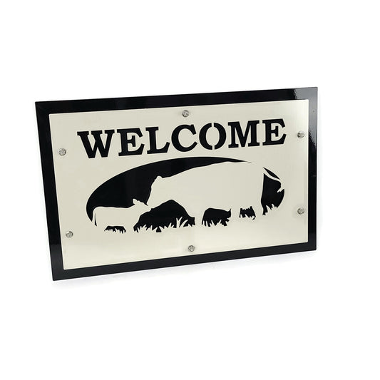 Brown over light gray layered cattle welcome sign