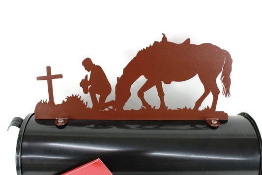 Hammered brown praying cowboy with horse mailbox topper installed on a mailbox