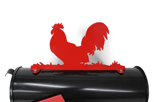 Red rooster mailbox topper installed on a mailbox