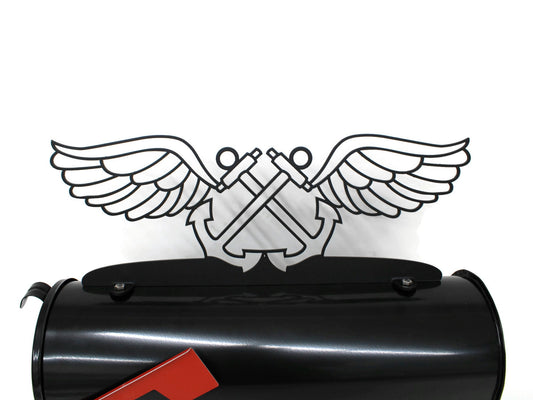 Black powder coat Navy service pin metal mailbox topper isntalled on a mailbox