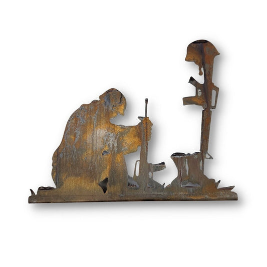 Rusty kneeling soldier with helmet and gun metal garden stake