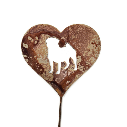 Heart-shaped rusty garden stake sign in rust with a pug dog silhouette