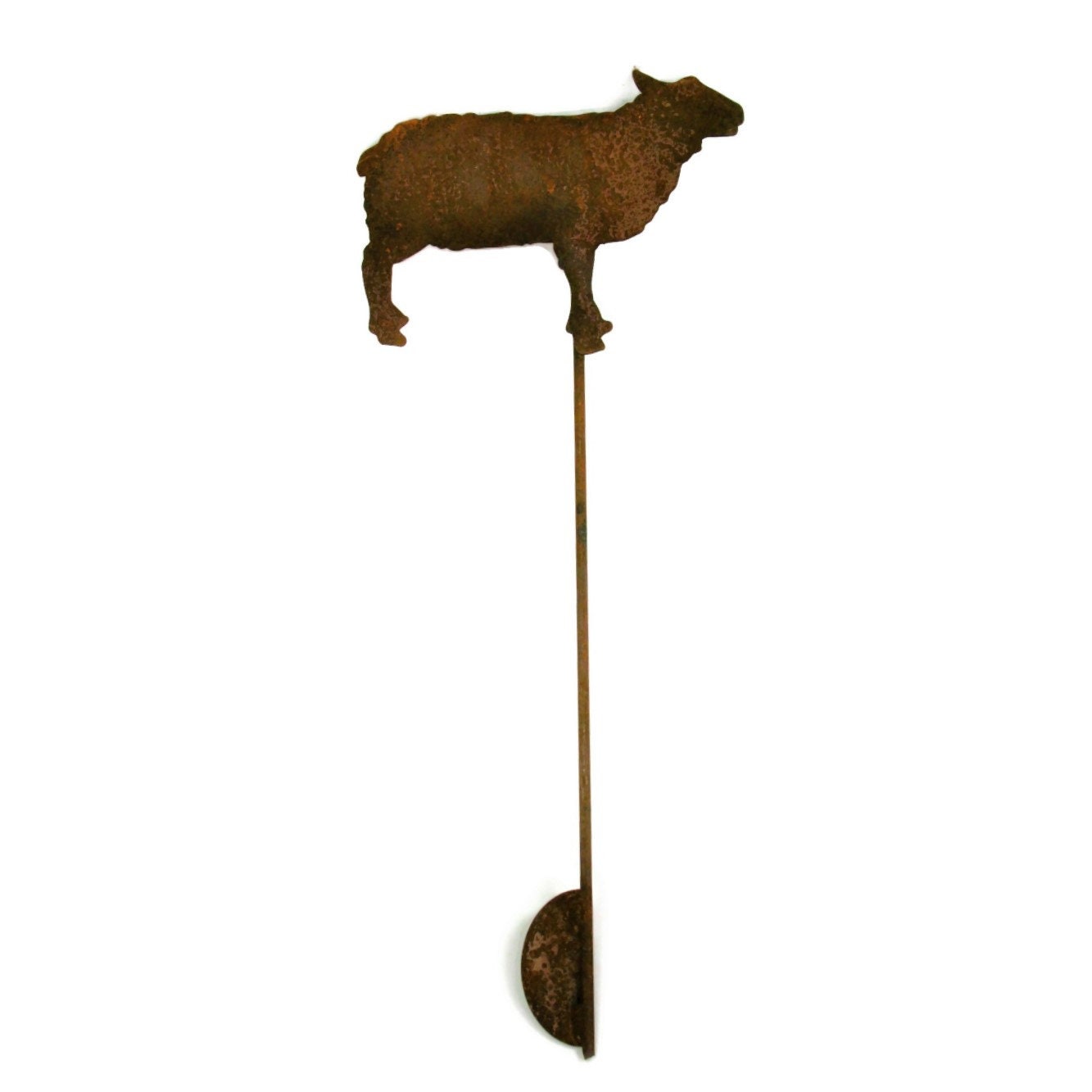 Rusty sheep shaped metal garden stake