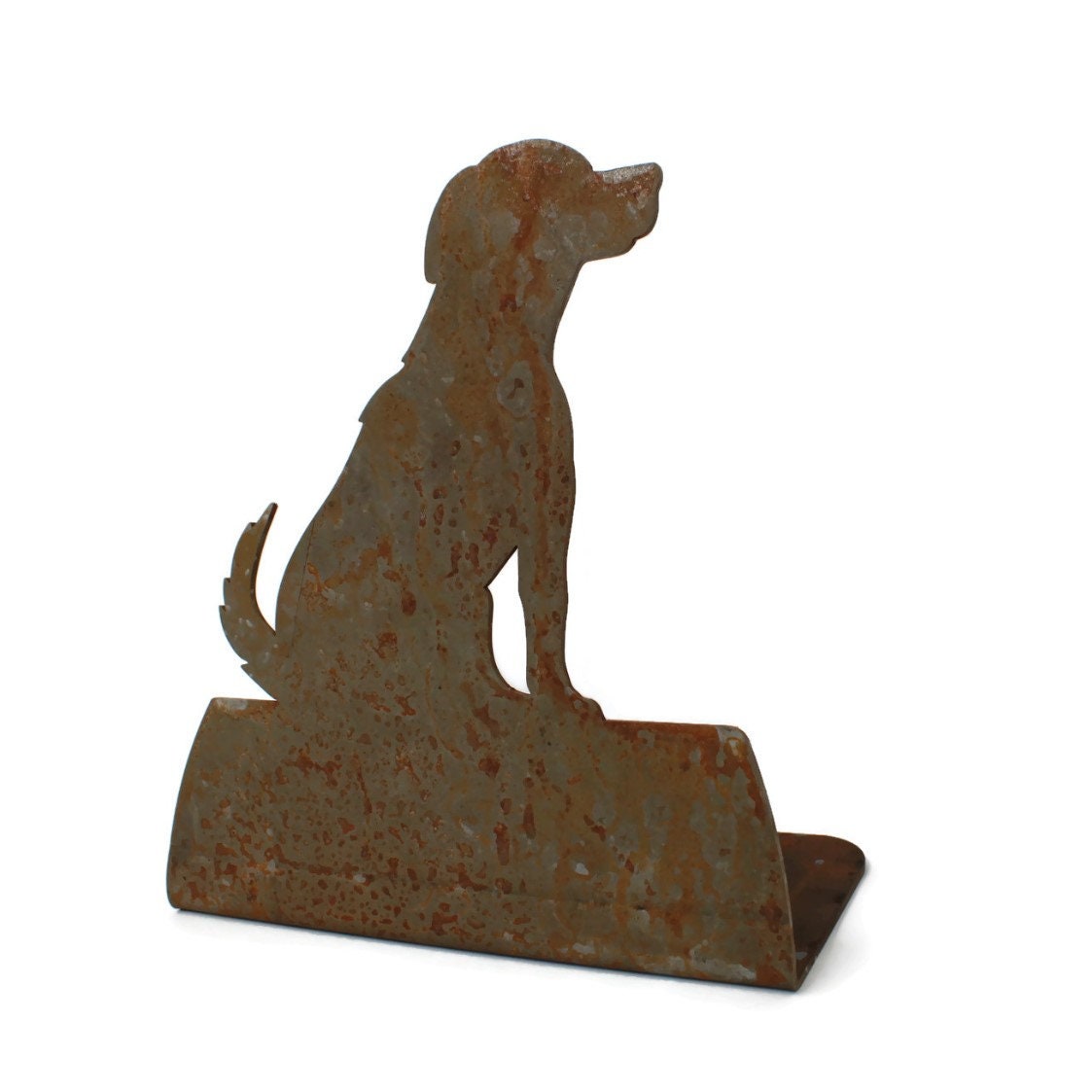 Rusty metal sitting dog stake