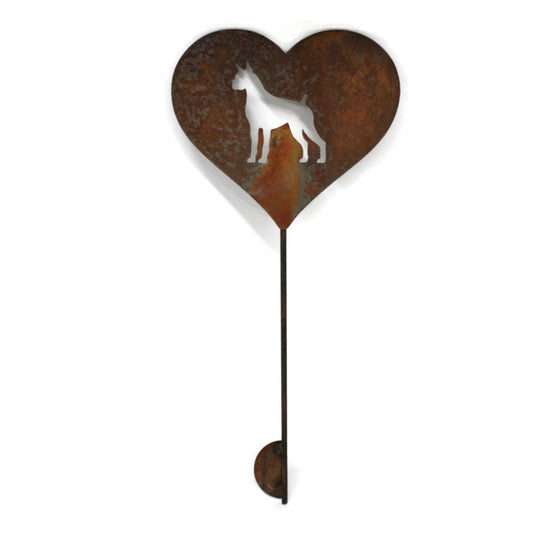 Heart-shaped rusty garden stake sign in rust with a boxer dog silhouette