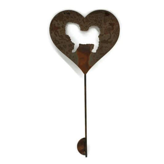 Heart-shaped rusty garden stake sign in rust with a shih tzu dog silhouette
