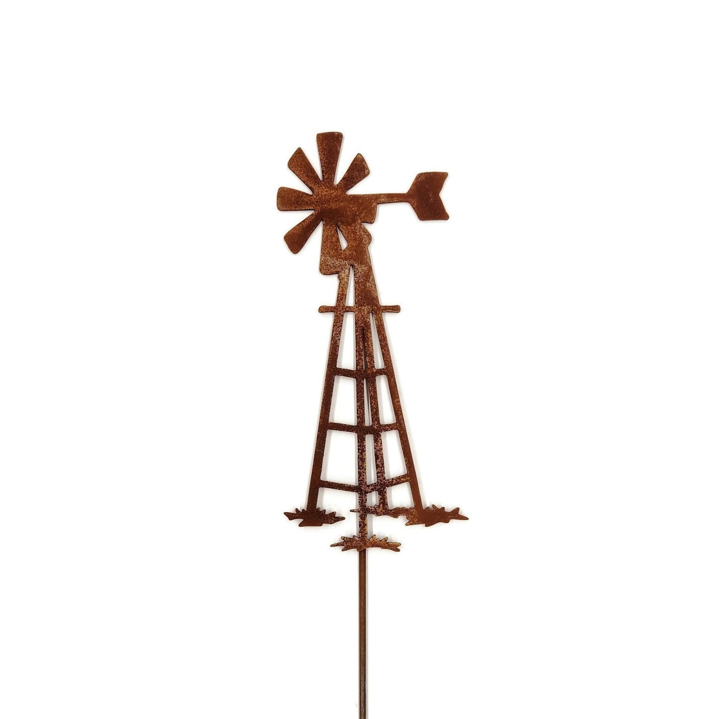 Rusty metal windmill garden stake
