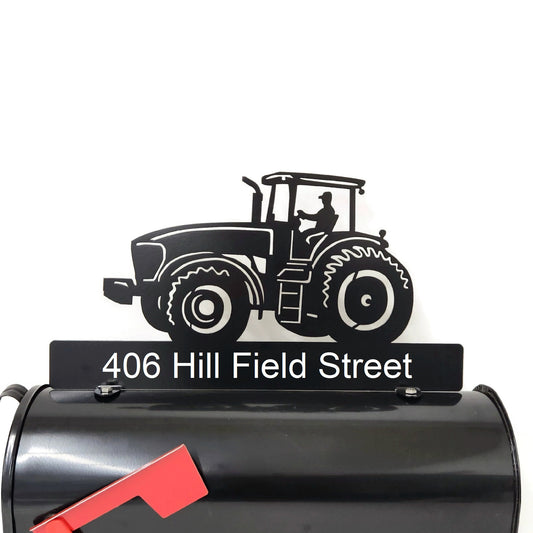 Black modern tractor custom mailbox topper with address installed on a mailbox