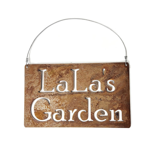 Custom hanging garden sign in rust with a wire hanger and Lala's Garden for text