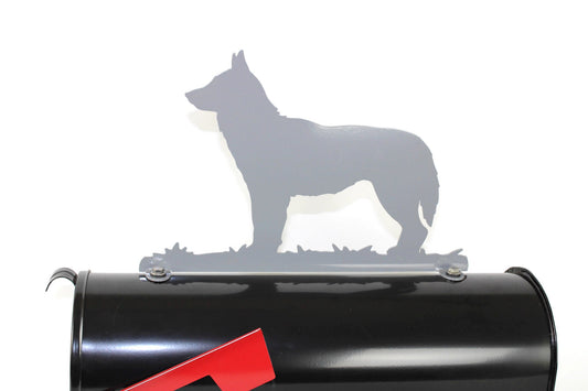 Gray Siberian Husky mailbox topper installed on a mailbox
