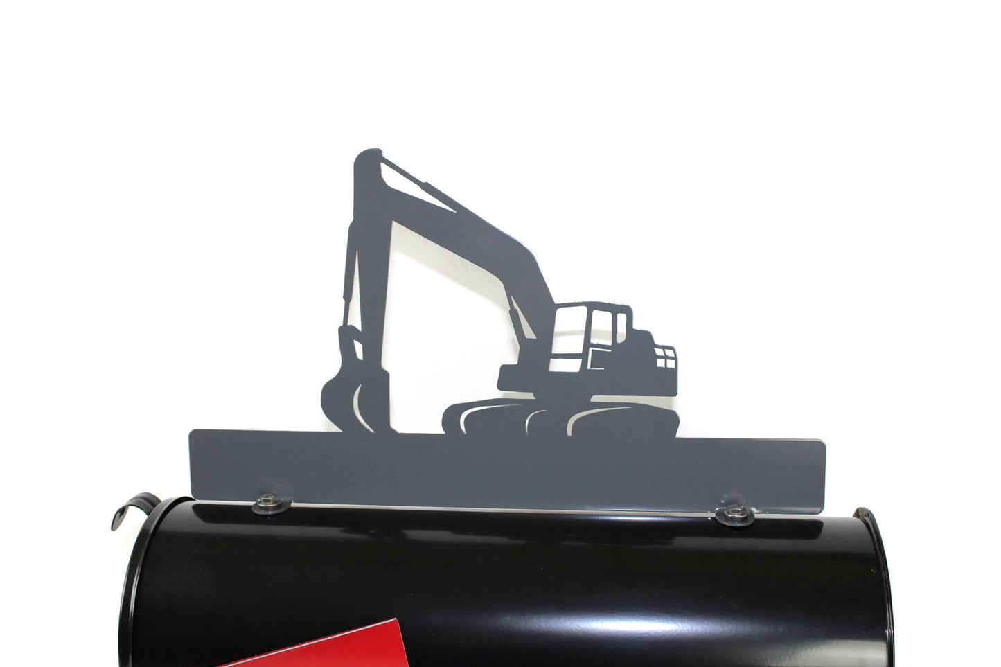 Dark gray excavator custom mailbox topper installed on a mailbox.