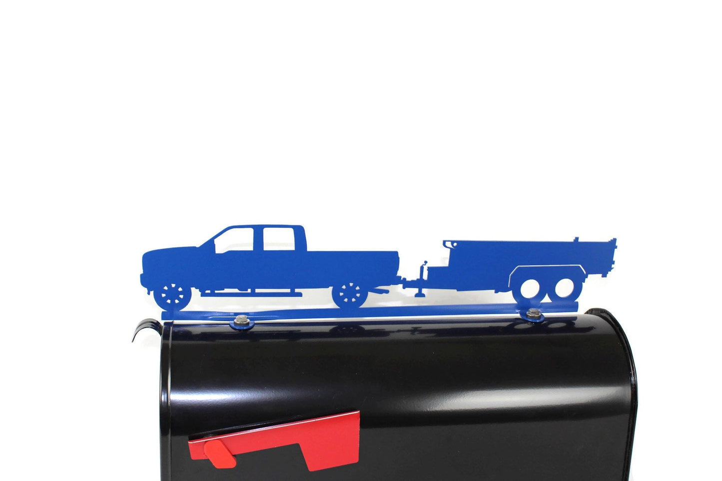 Blue pickup and dump trailer mailbox topper installed on a mailbox