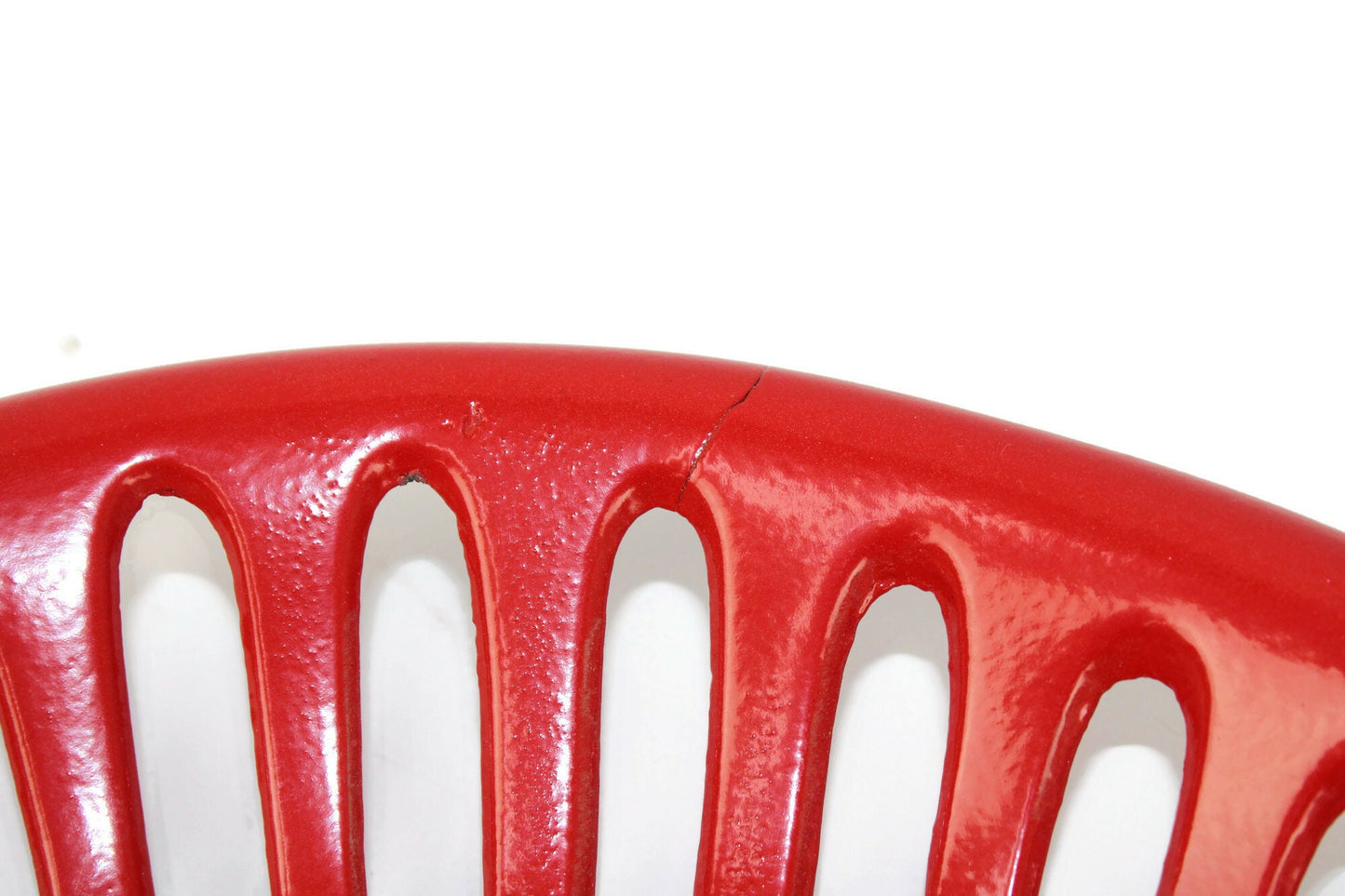 Red antique tractor seat close up